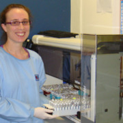 Sullivan Nicolaides Pathology staff in front of a PathFinder 350A